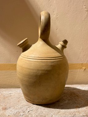 A clay jug called botijo in spanish. A traditional mud jar used to keep fresh water inside. clipart