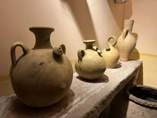 Stock image Four different clay jugs called botijo in spanish. A traditional mud jar used to keep fresh water inside.