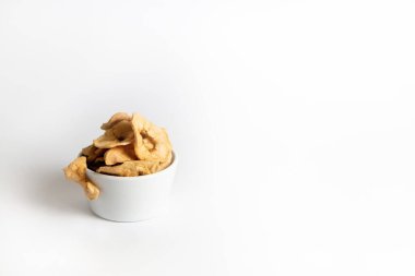 Dried apple slices in a white bowl