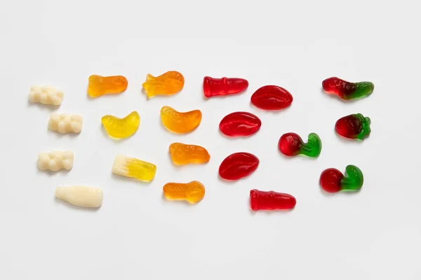 Colorful gummy candies on white background