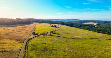 Blatna irrigation canal in the middle of autumn landscape at Ryzovna, Ore Mountains, Czech: Krusne hory, Czechia. Aerial view from drone. clipart