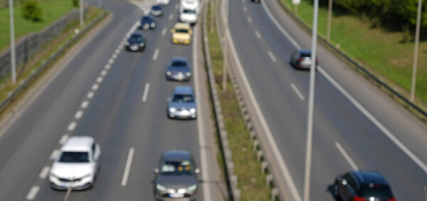 Cars traffic on the highway. Traffic jam on the highway. Blurred view.