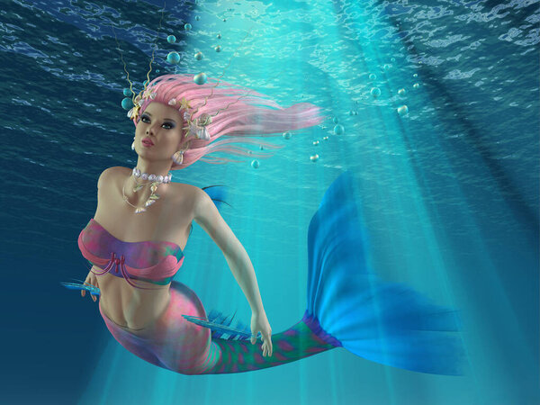 Turmaline the Mermaid swims underwater through rays of sunshine along with blue bubbles.
