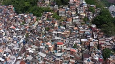 Cantagalo and Pavao-Pavaozinho Favelas. Rio de Janeiro, Brazil. Aerial View. Drone Flies Backwards and Upwards