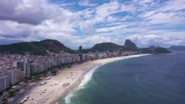 Rio de Janeiro City on Sunny Day. Copacabana Beach and Atlantic Ocean. Aerial View. Brazil. Drone Flies Forward and Upwards