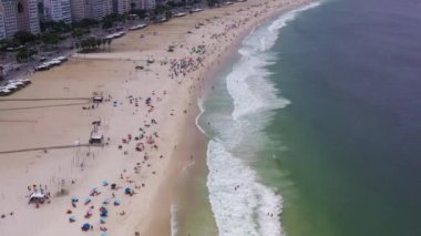 Rio de Janeiro City on Sunny Day. Copacabana Beach and Atlantic Ocean. Aerial View. Brazil. Drone Flies Backwards
