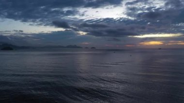 Hills and Ocean near Rio de Janeiro at Morning Twilight. Aerial View. Brazil. Drone Flies Sideways