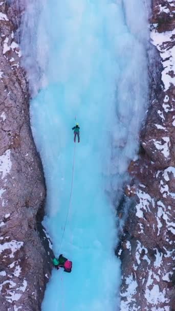 Man Leading Ice Ice Climbing Frozen Waterfall Aerial View Barskoon — Stock Video