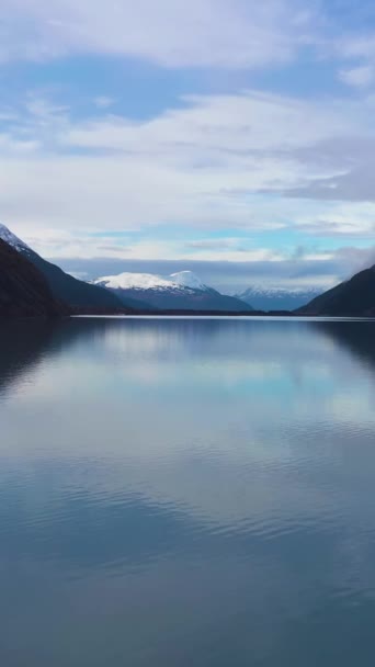 Portage Lake Reflection Ice Blocks Snow Capped Mountains Sunny Day — Stock Video