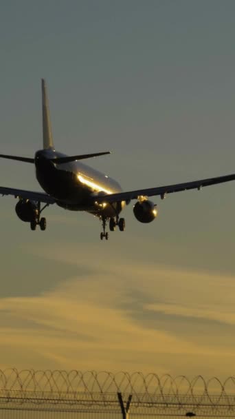 Silhouette Airplane Landing Airport Sunny Sunset Slow Motion Rear View — Stock Video