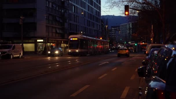 Geneva Switzerland February 2024 Tram People Busy Street Evening Twilight — Stock Video