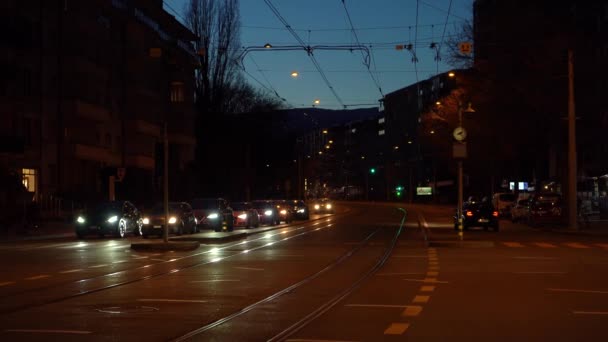 Geneva Switzerland February 2024 Tram People Busy Street Evening Twilight — Stock Video