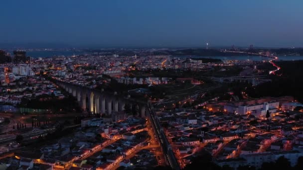 Illuminated Lisbon Skyline Aguas Livres Aqueduct 25Th April Bridge Night — 图库视频影像