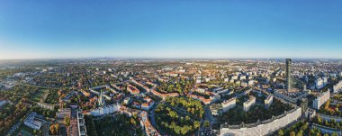 Wroclaw city panorama. Aerial view of modern european city with residential districts and street at summer morning clipart