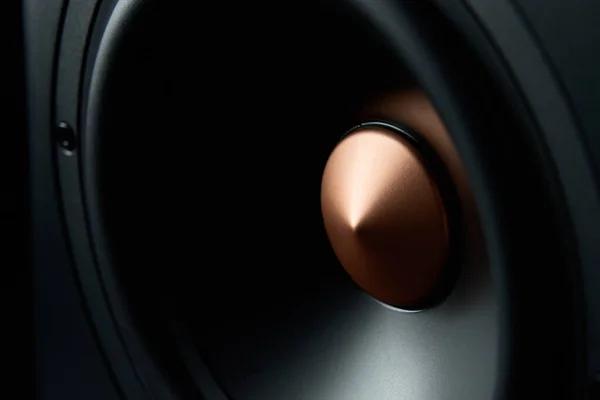 Sound speaker on dark background, close up. Set for listening music. Audio equipment