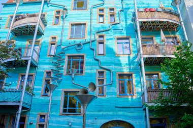 Kunsthofpassage in Neustadt district of Dresden, Germany. Quirky facade of residential building featuring musical instrument. Dresden, Germany - May 4, 2024 clipart