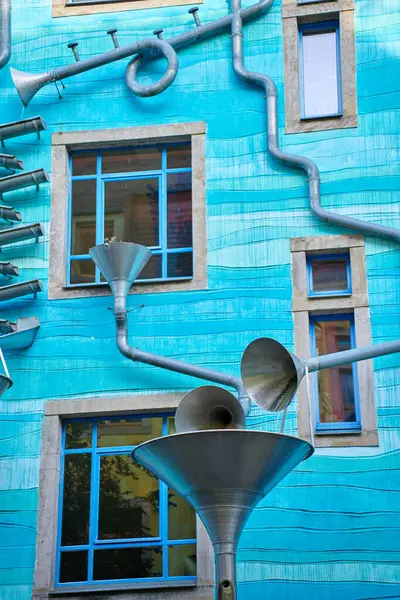 stock image Kunsthofpassage in Neustadt district of Dresden, Germany. Quirky facade of residential building featuring musical instrument. Dresden, Germany - May 4, 2024