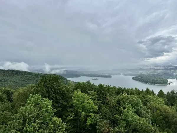 Stock image Lake Solina is a largest in Poland water reservoir surrounded by a characteristic landscape of mountains covered with forest and plenty of beaches with tourist infrastructure.