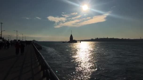 Walking Bosporus Maidens Tower Istanbul Sun Hangs Low Casting Shadow — Stock Video