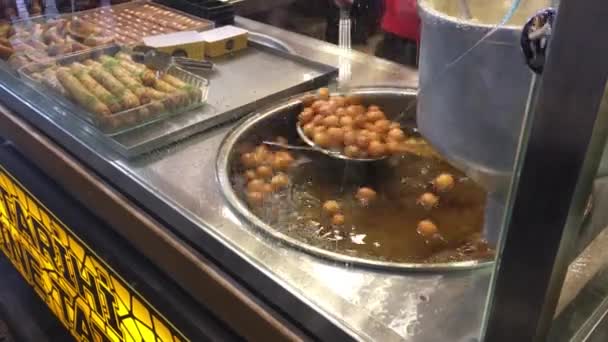 Unidentifiable Vendor Deep Fries Dough Balls Fill Vanilla Custard Make — Stock Video