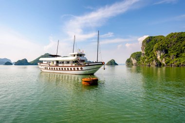 The ship carrying tourists anchored on Ha Long Bay, Quang Ninh province, Vietnam. Ha Long bay has been recognized by Unesco as a World Natural Heritage