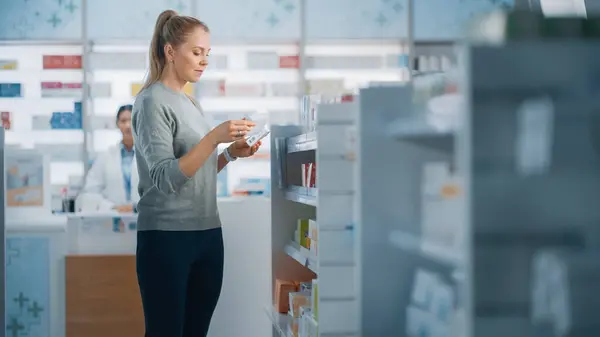 Pharmacy Drugstore Beautiful Caucasian Young Woman Chooses Buy Medicine Drugs — Stock Photo, Image