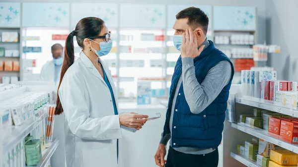 Covid Pharmacy Wearing Face Masks Professional Pharmacist Helping Handsome Male — Stock Photo, Image