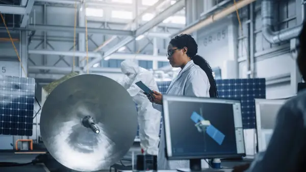 Female Engineer Uses Tablet Computer While Working Satellite Construction Aerospace — Stock Photo, Image