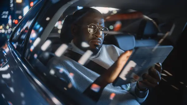 Stylish Black Man Glasses Commuting Home Backseat Taxi Night Male — Stock Photo, Image