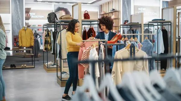 Customers Shopping Modern Clothing Store Retail Sales Associate Assists Client — Stock Photo, Image