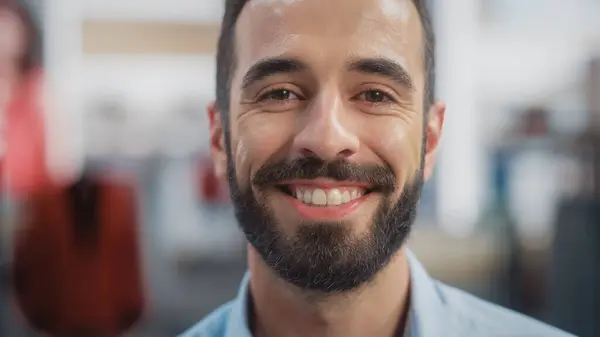 Portrett Happy Handsome Store Assistant Blue Shirt Smiling Posing Camera – stockfoto