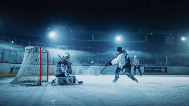 Buz hokeyi sahası: Forward Player 'a karşı Slapshot atan, Puck' ı Stick Skorları ile şutlayan, kaleci kaçırdı. Goaltender 'a karşı 1 numaralı forvet..