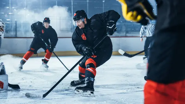 Ice Hockey Rink Arena: Professional Defender Player Attacks, Pushing Attacker, Trying to take the Puck. Competitive Game with Skill, Speed, Energy, Power.