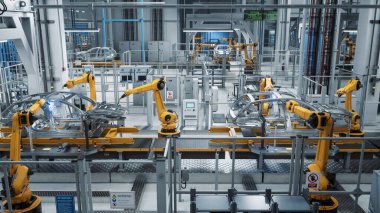 Otomatik Robot Silahlanma Hattı Yüksek Teknolojik Yeşil Enerji Elektrikli Araçlar Üretimi. İnşaat, Bina, Kaynak Endüstrisi Üretim Taşıyıcısı. Yükseltilmiş Geniş Görüş