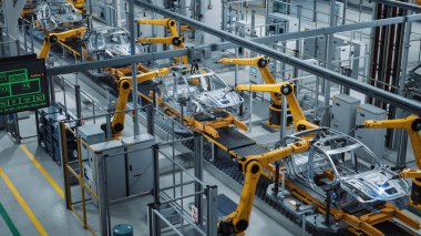 Otomatik Robot Silahlanma Hattı Yüksek Teknolojik Yeşil Enerji Elektrikli Araçlar Üretimi. İnşaat, Bina, Kaynak Endüstrisi Üretim Taşıyıcısı. Yükseltilmiş Geniş Görüş