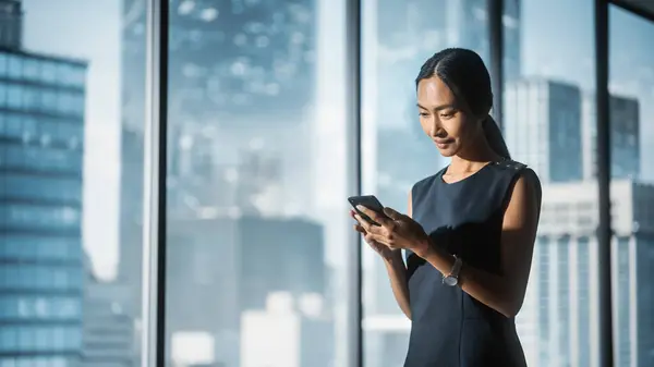 Successful Businesswoman Stylish Dress Standing Modern Office Using Smartphone Looking — Stock Photo, Image