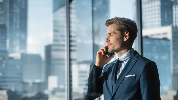 Confident Young Businessman Suit Walking Modern Office Talking Phone Looking Royalty Free Stock Photos