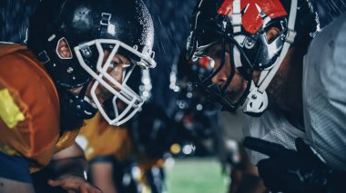 Two Professional American Football Teams Stand Opposite Each Other, Ready to Start the Game. Defense and Offense Prepare to Fight for the Ball with Desire to Score Points and the Goal and Win. clipart