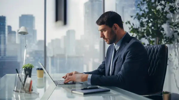 Thoughtful Young Businessman Perfect Tailored Suit Standing His Modern Office — Stock Photo, Image
