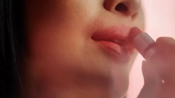 Beautiful Anonymous Woman Applies Cosmetics Lipstick Her Sensuous Full Lips — Stok Foto