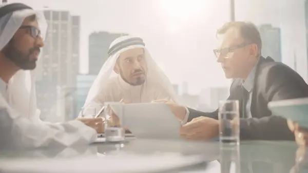 International Business Consultant Advises Financial Strategy Plan Successful Arab Company Stok Lukisan  