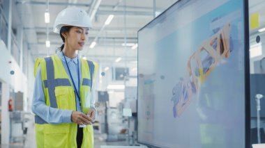Factory Office Meeting: Chief Engineer Explaining New Workflow for Heavy Industry Hydraulic Parts Production to Company Director in a Conference Room