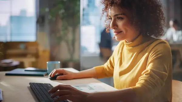 stock image Confident Arab Businesswoman Sitting in Creative Agency, Manager Working on Implementing Modern Business Strategy for Client. Female Browsing Internet