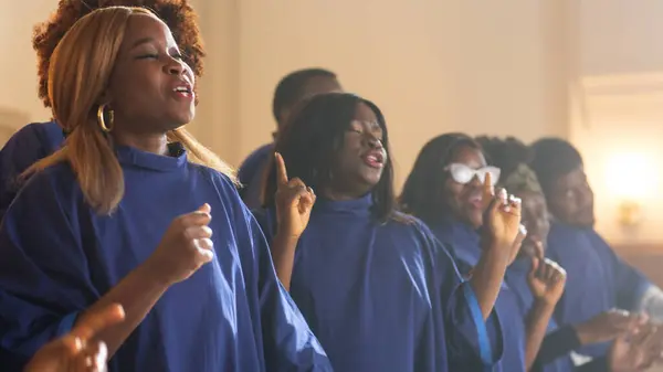 stock image Group Of Christian Gospel Singers Praising Lord Jesus Christ. Song Spreads Blessing, Harmony in Joy and Faith. Church is Filled with Spiritual Message