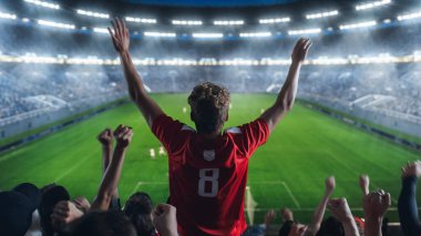 Futbol Şampiyonası Maçı sırasında taraftarların takımları için stadyumda tezahürat yapmalarının arkası. Takımlar oynar, Taraftarlar Zaferi ve Hedefi Kutlar. Futbol mu?