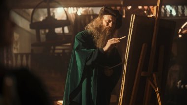 Rönesans dönemi kavramı: Üst düzey erkek ressamın tuvaldeki resmine detaylar eklemesinden esinlenilmiştir. Sanat Stüdyosunda profesyonel bir ressam.