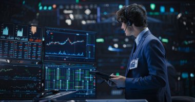 Uluslararası Borsada Çalışan Genç Bir Adamın Portresi: Tablet Bilgisayar Kullanımı, Finansal Piyasaların İzlenmesi