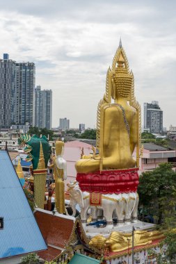 The view of the Bangkok skyline, the mix of old and modern buildings