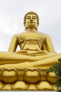 Giant seated Buddha at Wat Paknam in Bangkok, Thailand