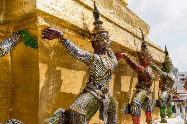 The Statues of demon guardians at the Grand Palace in Bangkok, Thailand